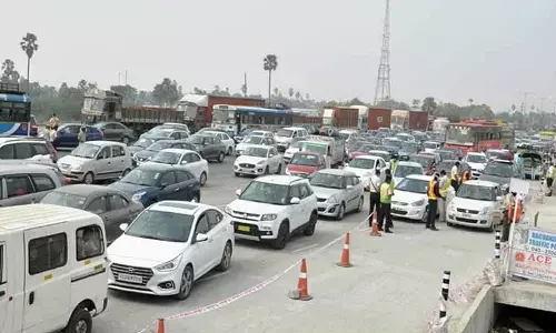 trafic, vijayawada high way, toll plaza, sankranthi festival