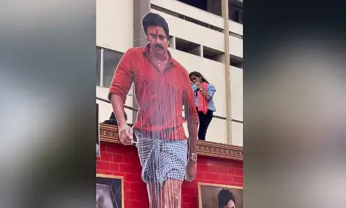 పవన్ కల్యాణ్ లేడీ ఫ్యాన్ హంగామా.. కటౌట్ పైకి ఎక్కి..