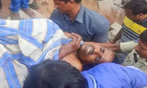 poacher stuck in rocks, kamareddy district