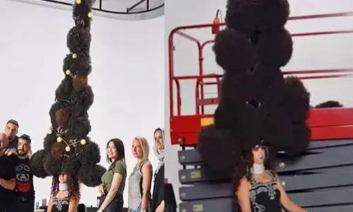 christmas tree with hair, syrian hair stylist record, guinness world records