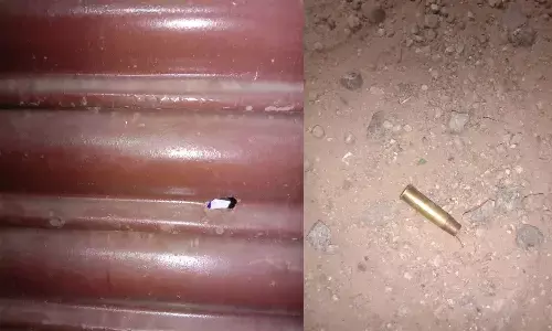 గాలిలోకి కాల్పులు : రెండు లక్షల దోపిడీ