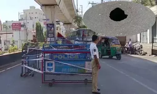 road collapsed, hole, hyderabad
