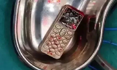 girl swallows cell phone