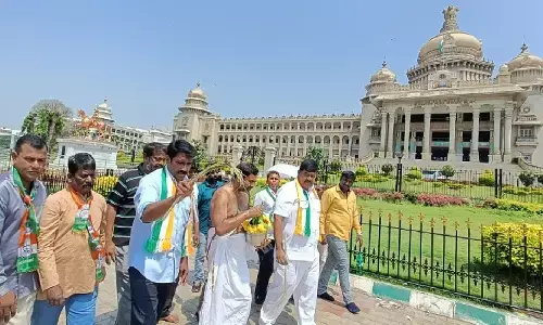 మాట నిలబెట్టుకున్న కాంగ్రెస్‌.. గోమూత్రంతో కర్ణాటక విధాన సౌధ శుద్ధి