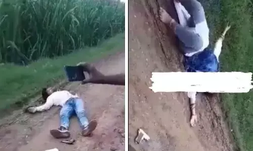 భార్యను కాల్చి.. భర్త ఆత్మహత్య.. వీడియోలు తీస్తూ ఆనందించిన స్థానికులు