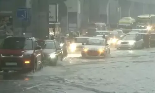 heavy rain,  hyderabad, traffic, police