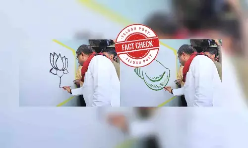 Union Minister Dharmendra Pradhan was painting Lotus on a wall