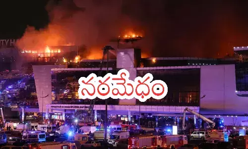 Russia : రష్యాలో తెగబడిన ఉగ్రవాదులు ..60 మంది మృతి