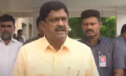 payyavula keshav, finance minister, serious , rushikonda building