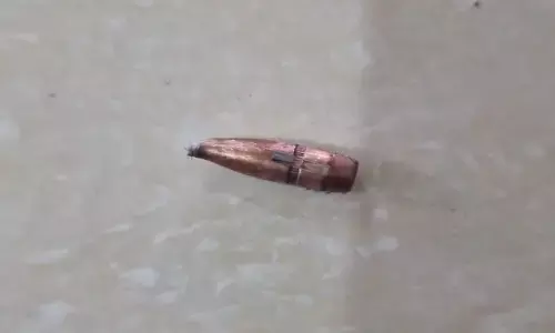 హైదరాబాద్ లోని అపార్ట్మెంట్ లోకి దూసుకొచ్చిన బుల్లెట్