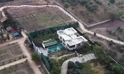 Janwada farm house, irrigation department officials, ktr, measurements