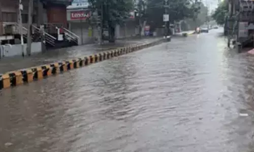 heavy rain,  flooded, roads and rtc busstand, vijayawada