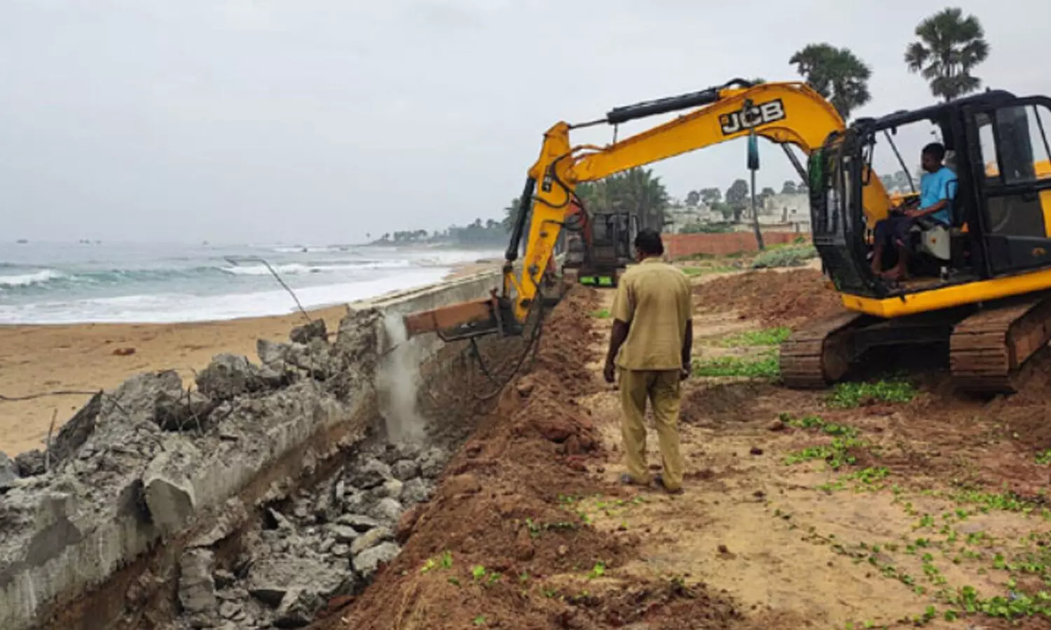 vijayasai reddy, nehareddy, encroached,  demolishing, ycp rajya sabha member vijayasai reddys daughter nehareddy, officials are demolishing encroached buildings  belonging to vijayasai reddys daughter nehareddy, nehareddy news today telugu, Ap news today telugu