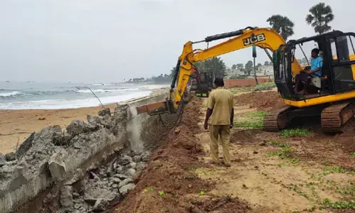 vijayasai reddy, nehareddy, encroached,  demolishing, ycp rajya sabha member vijayasai reddys daughter nehareddy, officials are demolishing encroached buildings  belonging to vijayasai reddys daughter nehareddy, nehareddy news today telugu, Ap news today telugu