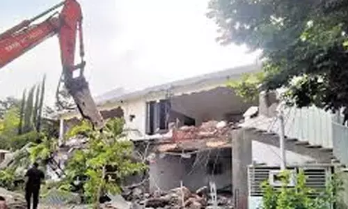 demolition illegal constructions, kokapet, hyderabad