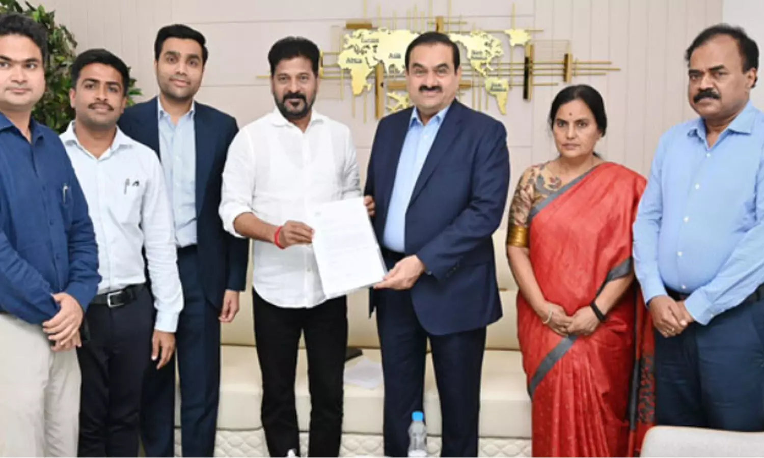 adani group, huge donation, hundred crore rupees,  telangana