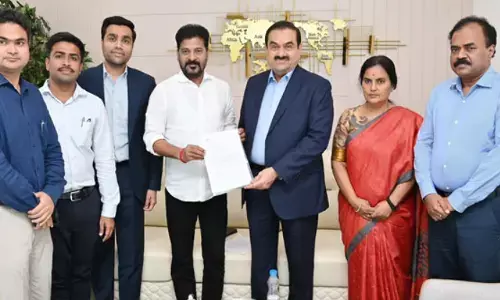 adani group, huge donation, hundred crore rupees,  telangana