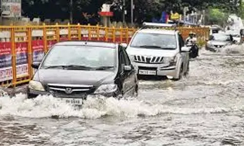 heavy rains,  seven districts, orange alert,  tamil nadu