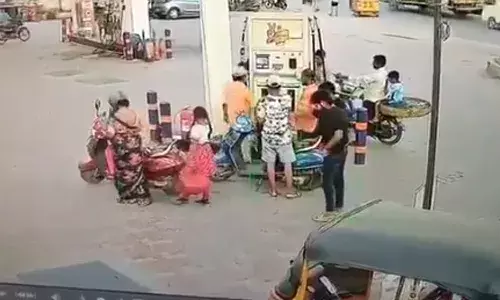 drunken man,  set fire, petrol station, hyderabad
