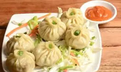 woman died eating momos, momos in banjara hills, singadikunta, hyderabad latest news updates, food poision in hyderabad