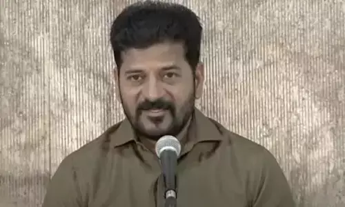 revanth reddy, chief minister, rejecting,  adani group