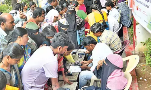 women, queue up ,post offices, andhra pradesh