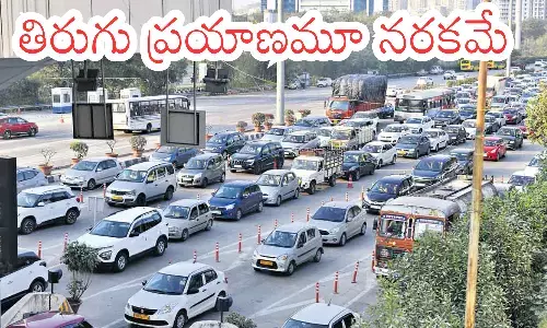heavy traffic,  hyderabad-vijayawada highway, sankranti festival , toll plaza