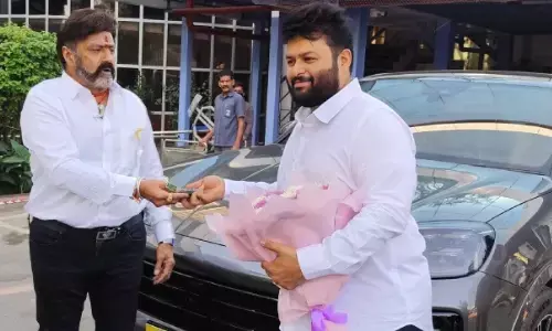 nandamuri balakrishna,  presented, gift, music director thaman