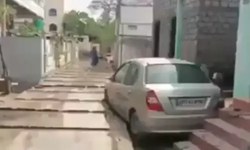 car, concrete road,  strange incident, bapatla