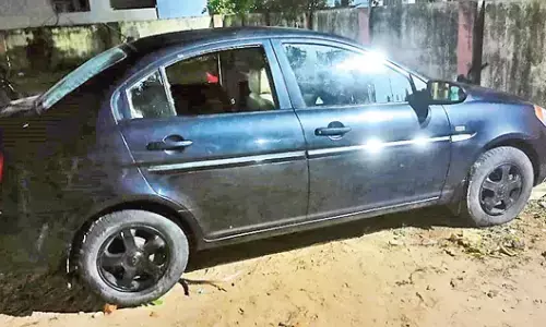 four children died, trapped , car, vizianagaram district