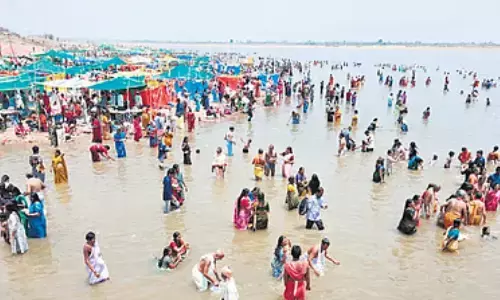 devotees, flocking,  saraswati pushkaram