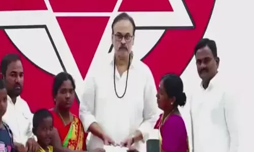 cheques,  distribute,  jana sena workers, nagababu