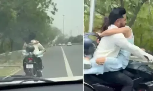 పెట్రోల్ ట్యాంక్ పై కూర్చుని రొమాన్స్.. ఫైన్ ఎంత కట్టాలంటే?