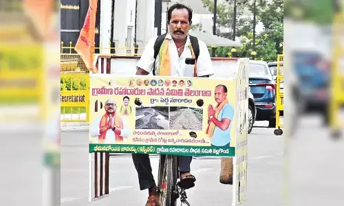 రోడ్లు బాగుచేయండంటూ.. 145 కిలోమీటర్లు ప్రయాణం