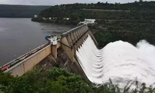 flood flow,  continues,   srisailam reservoir, andhra pradesh