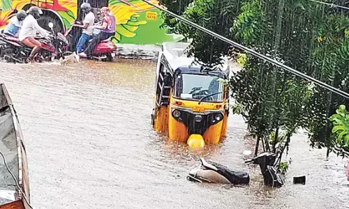 heavy rains,  lashed, flooded, visakhapatnam