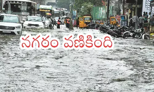 heavy rain, submerged, several areas, hyderabad