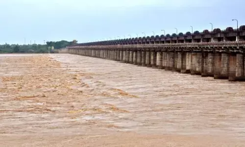 godavari river continues to flow, first danger warning , dhavaleswaram project, andhra pradesh