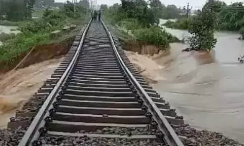 heavy rains have caused inconvenience, railway track washed away ,  kamareddy, telangana.