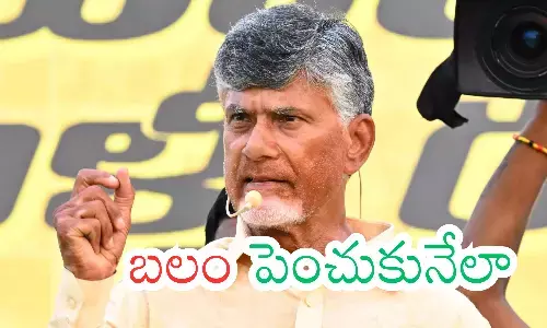 Chandrababu Naidu welcoming MLCs into TDP with party scarves.