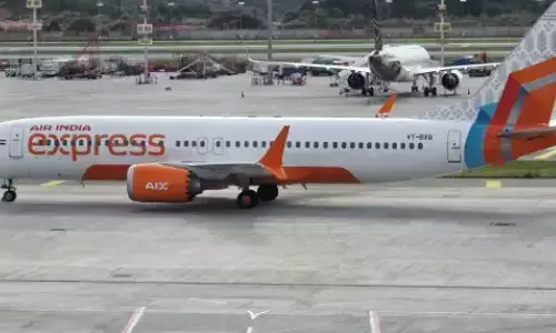 passenger tried to open the cockpit door,  air india plane, bengaluru to varanasi, india