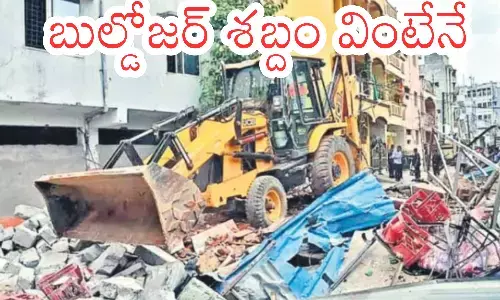 HYDRA team demolishing illegal constructions during land recovery operation in Hyderabad.
