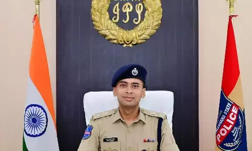 Adilabad SP Akhil Mahajan addressing cyber fraud awareness press meet