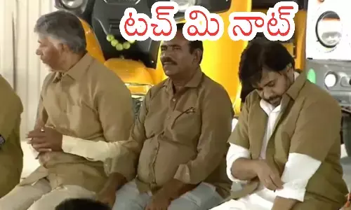 pawan kalyan appears serious and silent during a recent Vijayawada public event amid tdp and janasena alliance tensions.