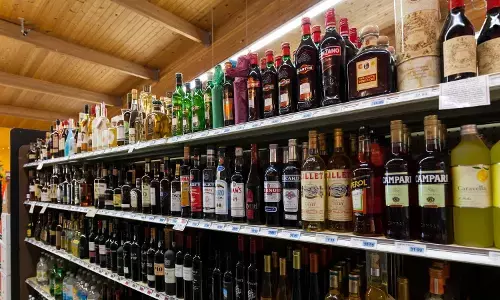 Telangana Excise officials processing liquor shop licence applications 2025