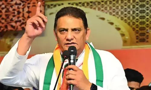 mohammed azharuddin to join telangana cabinet today