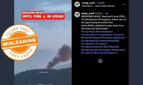 Fire emitting from a green mountain with a text saying that its from HPCL in Vizag