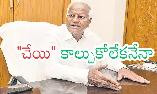 Kadiyam Srihari seen at a political event amid controversy over his alleged Congress defection and disqualification demands.