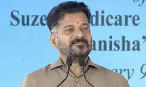 revanth reddy said that talks should be held to resolve the water disputes between andhra pradesh and telangana