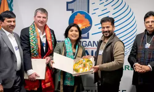 telangana chief minister revanth reddy met  world cconomic forum md jeremy jurgens  in davos